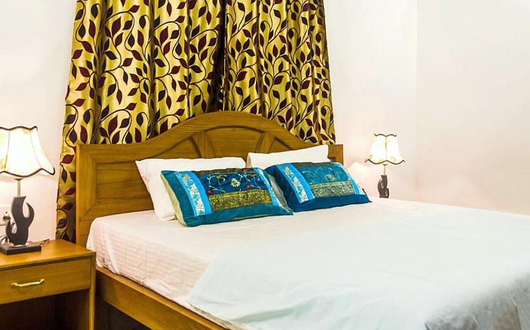 Postel nebo postele na pokoji v ubytování Eve Resort