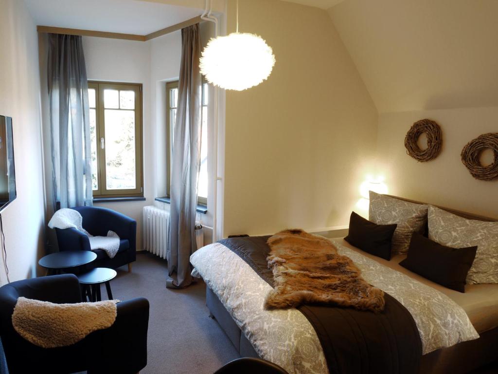 Postel nebo postele na pokoji v ubytování Comfort-Hotel garni Schierker Waldperle - inklusive Wellness