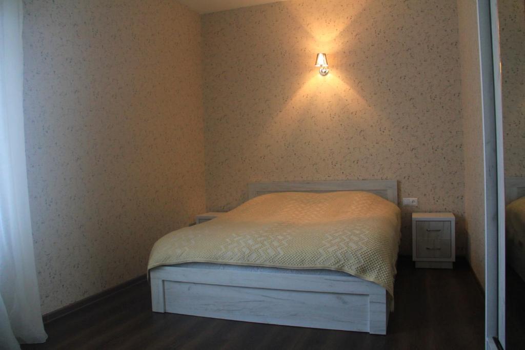 Postel nebo postele na pokoji v ubytování Guest house Fifty