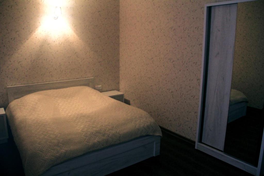 Postel nebo postele na pokoji v ubytování Guest house Fifty