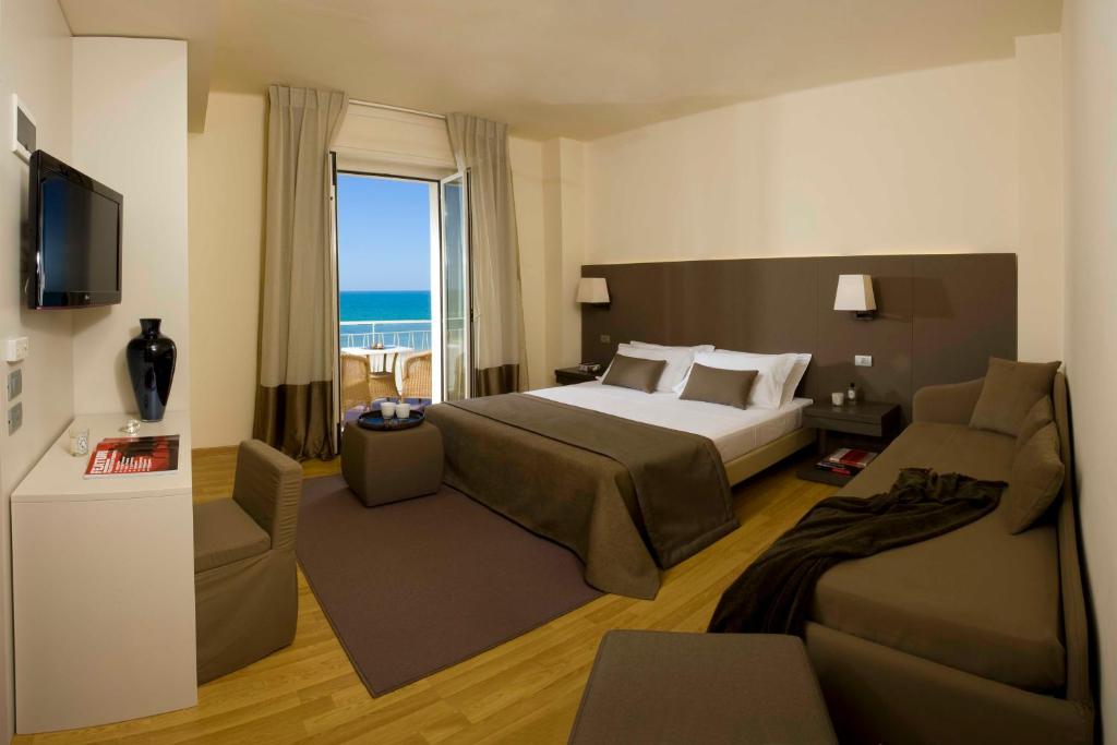 TV a/nebo společenská místnost v ubytování Hotel Miramare