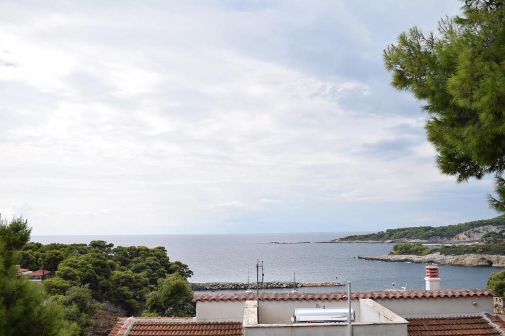 a view of the ocean from a house at Evagelia's Houses in Votsi