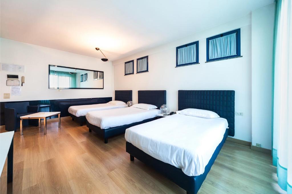 Postel nebo postele na pokoji v ubytování Park Hotel Residence