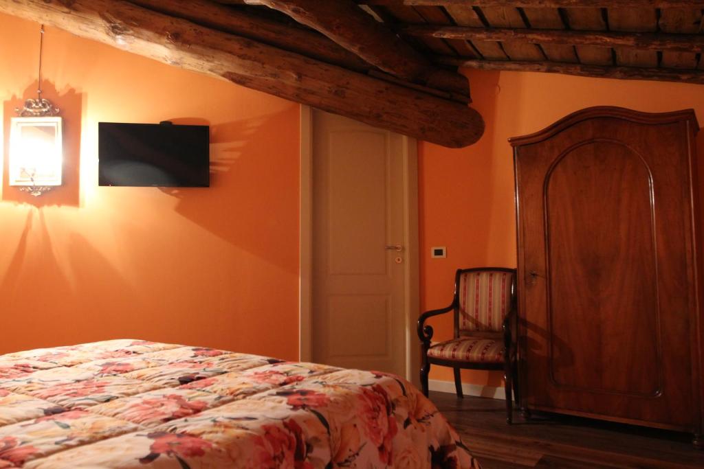 Postel nebo postele na pokoji v ubytování Relais Corte Sant' Agata B&B