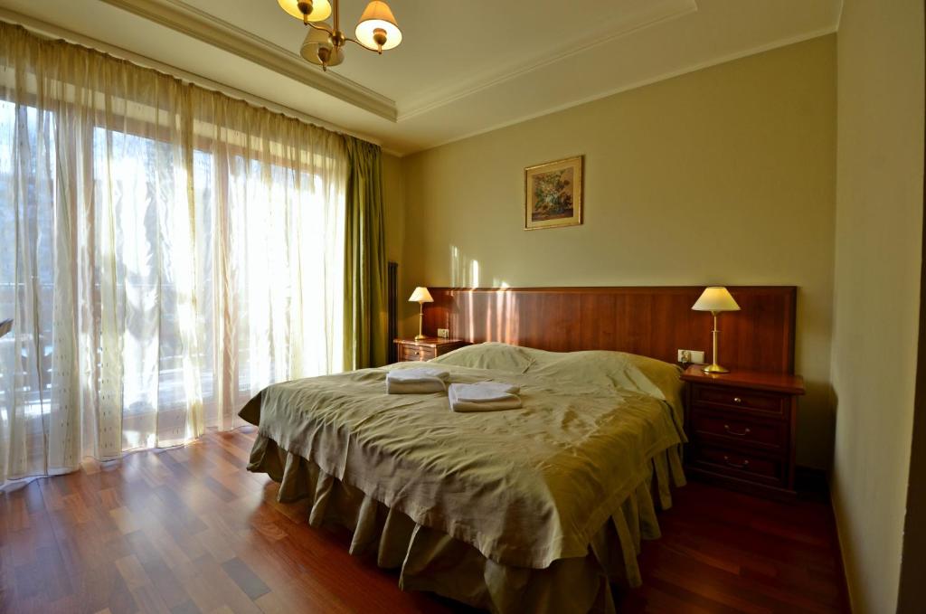 Llit o llits en una habitació de Pensjonat Nad Rzeką