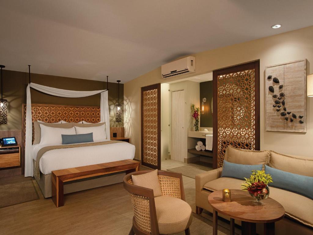 Voodi või voodid majutusasutuse Secrets Papagayo All Inclusive - Adults Only toas