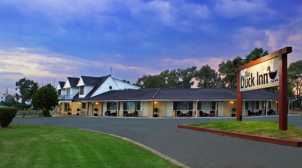 a building with a sign in front of it at The Duck Inn Apartments in Tamworth