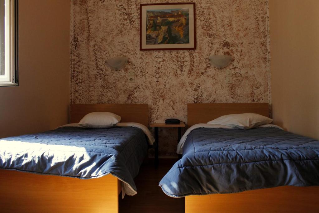 Postel nebo postele na pokoji v ubytování Electra Hotel Piraeus