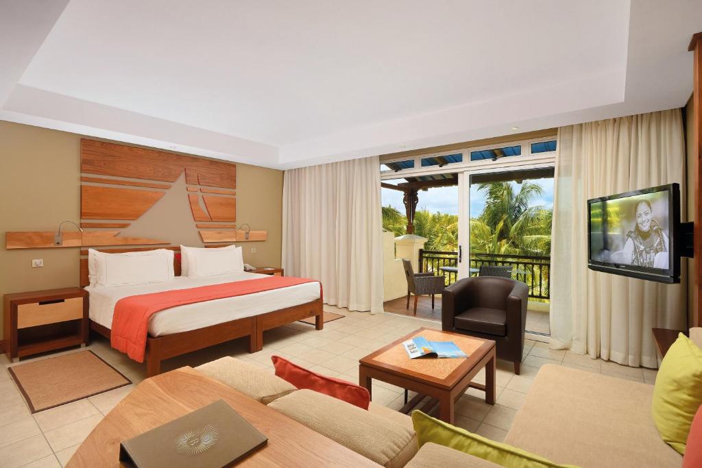 Телевизор и/или развлекательный центр в Shandrani Beachcomber Resort & Spa