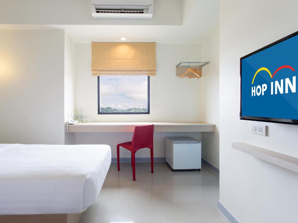 TV a/nebo společenská místnost v ubytování HOP INN Mukdahan
