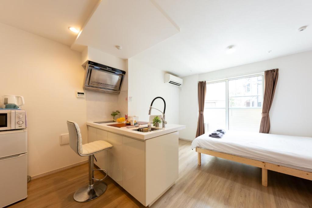 Ikebukuro Cozy Inn 池袋暖居