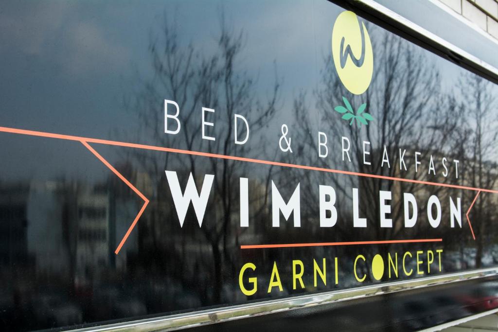 Certifikát, hodnocení, plakát nebo jiný dokument vystavený v ubytování B&B Wimbledon Garni Concept