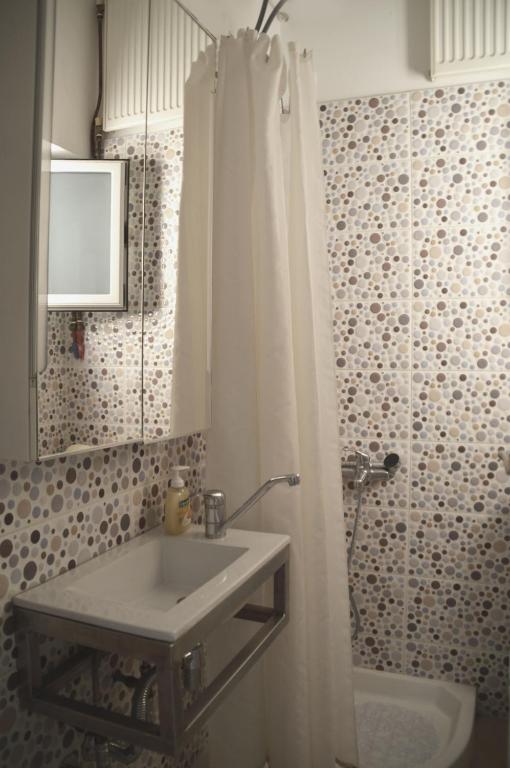 A bathroom at Christini Apartment