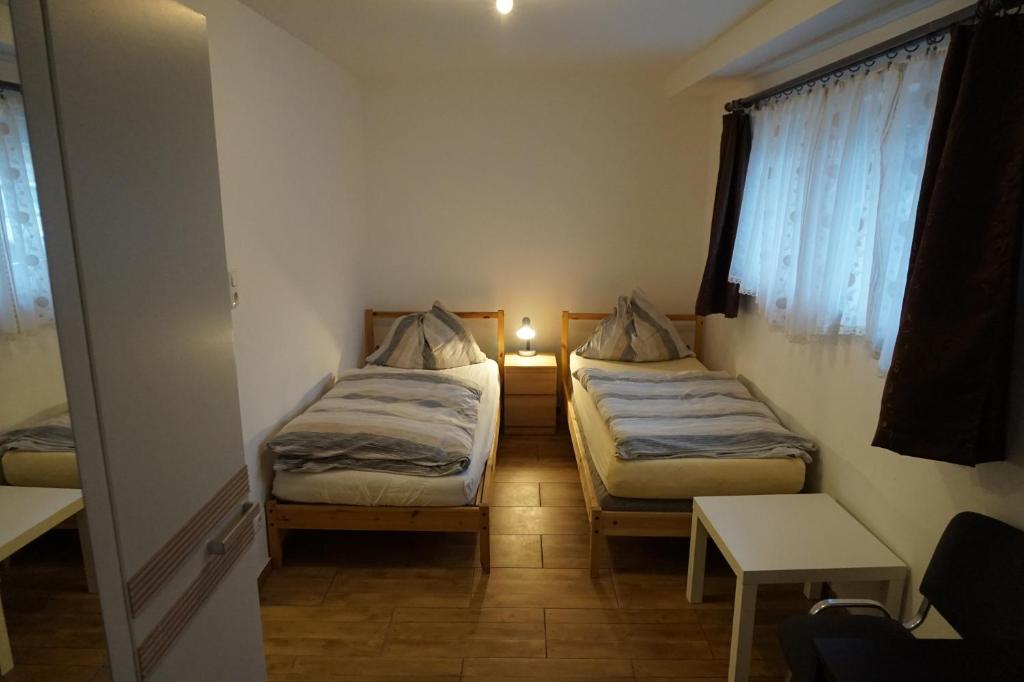 Postel nebo postele na pokoji v ubytování Apartment Zirkusstraße
