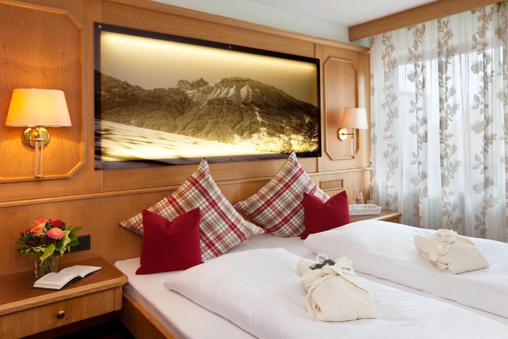 Postel nebo postele na pokoji v ubytování Hotel Berghof