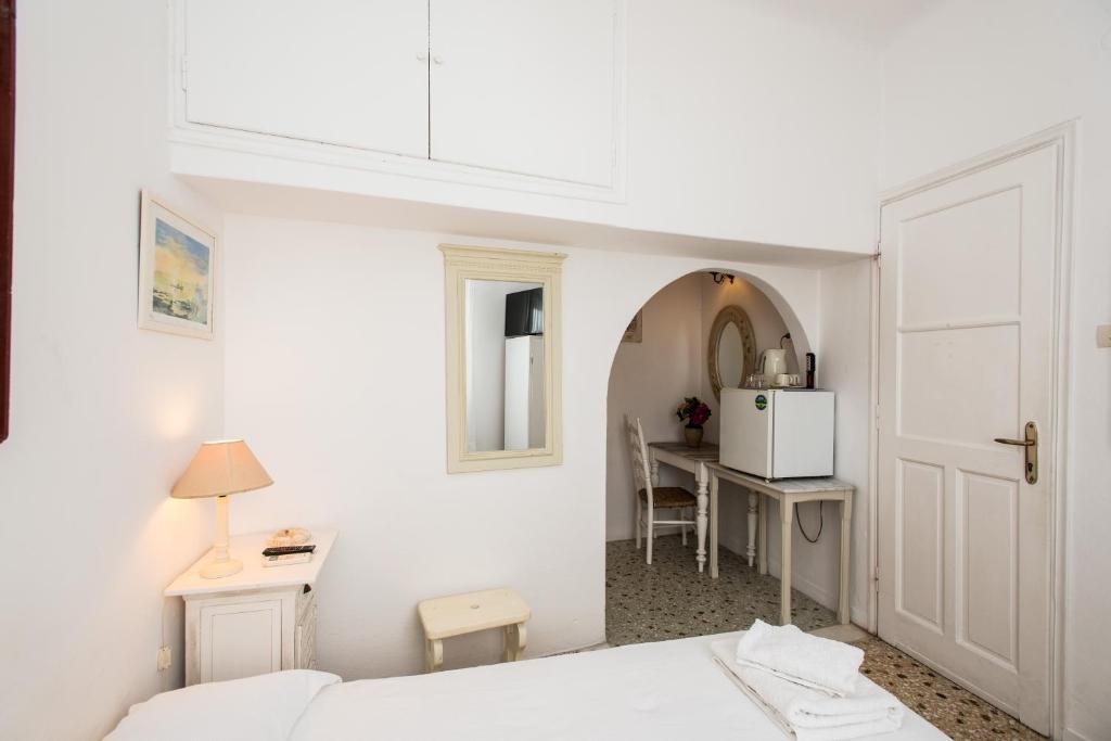 Voodi või voodid majutusasutuse Hotel Delphines toas