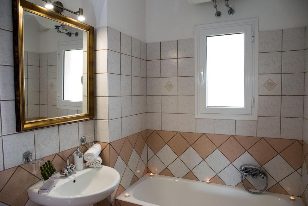 Koupelna v ubytování Dina Apartments