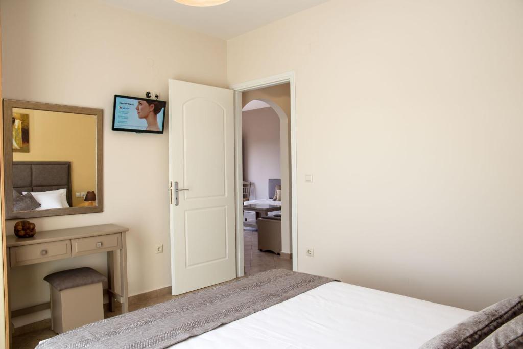 Postel nebo postele na pokoji v ubytování Dina Apartments