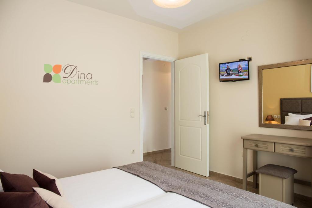 Postel nebo postele na pokoji v ubytování Dina Apartments