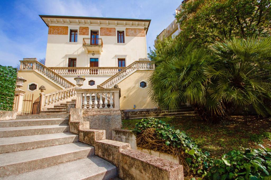 a building with stairs leading up to it at Alla Villa Liberty Bed & Breakfast in Verona