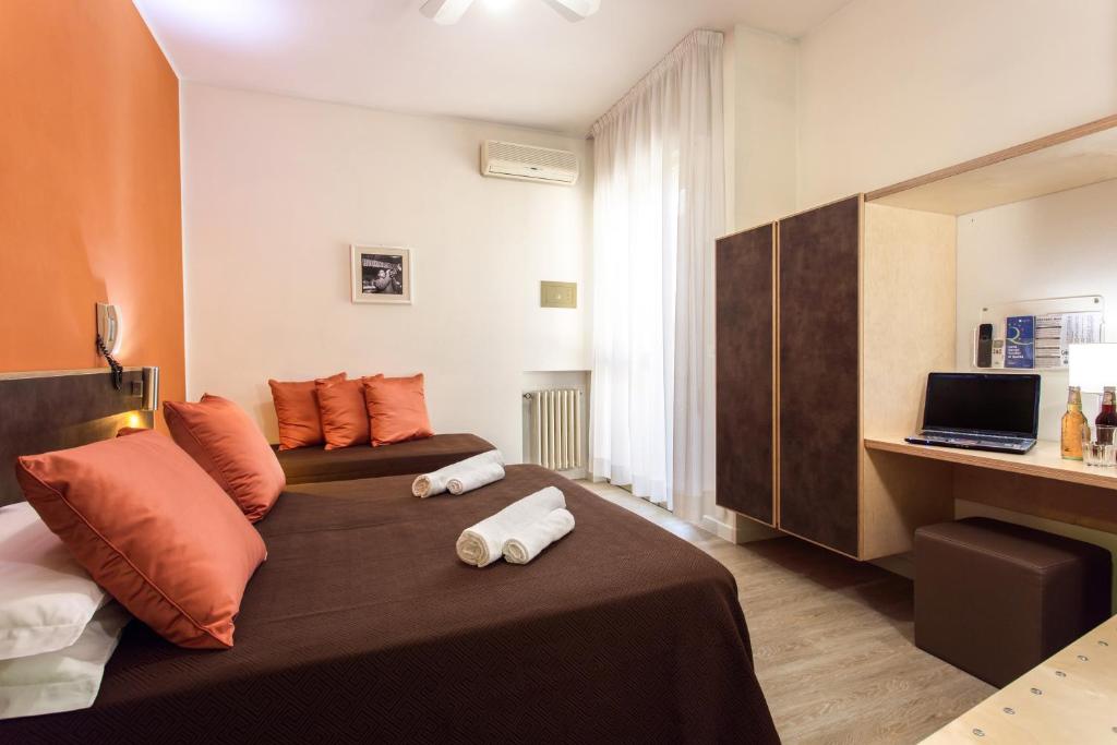 Postel nebo postele na pokoji v ubytování Hotel Antares