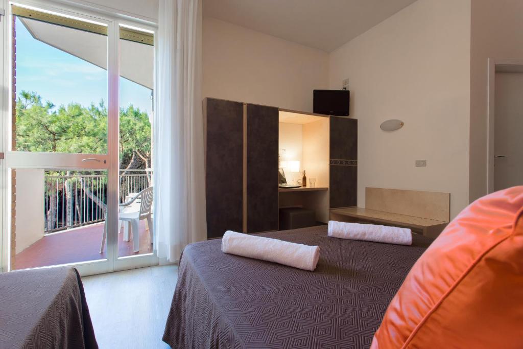 Postel nebo postele na pokoji v ubytování Hotel Antares