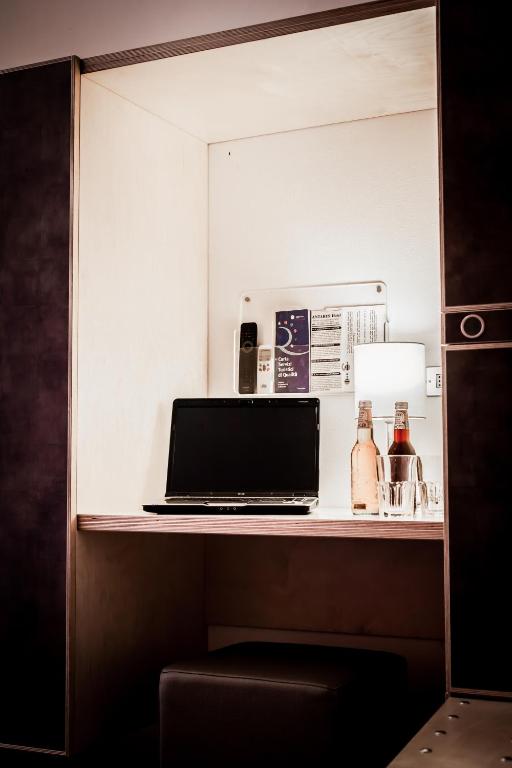 TV a/nebo společenská místnost v ubytování Hotel Antares