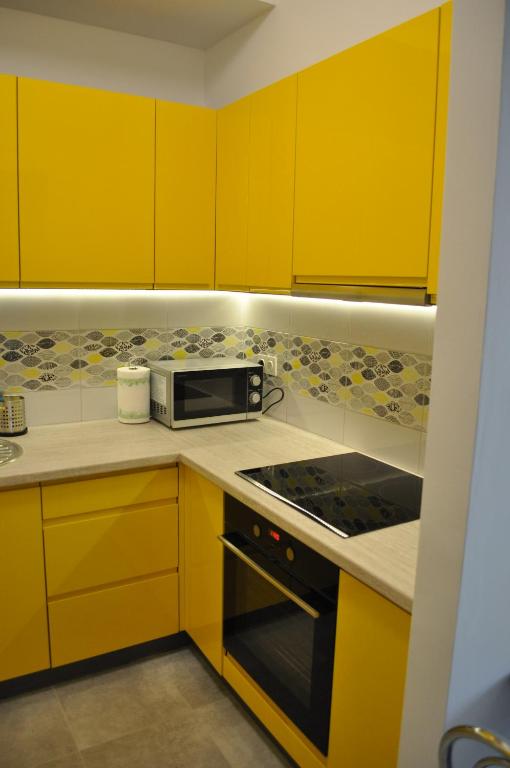 Kuchyňa alebo kuchynka v ubytovaní Pop Art Apartments