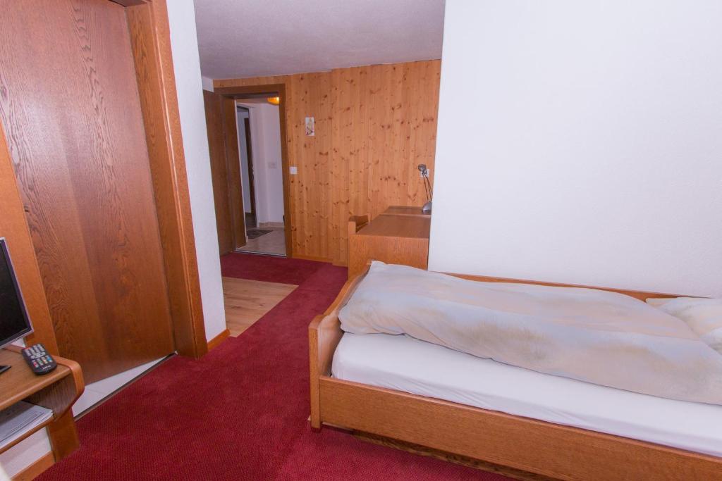 Postel nebo postele na pokoji v ubytování Monte Rosa