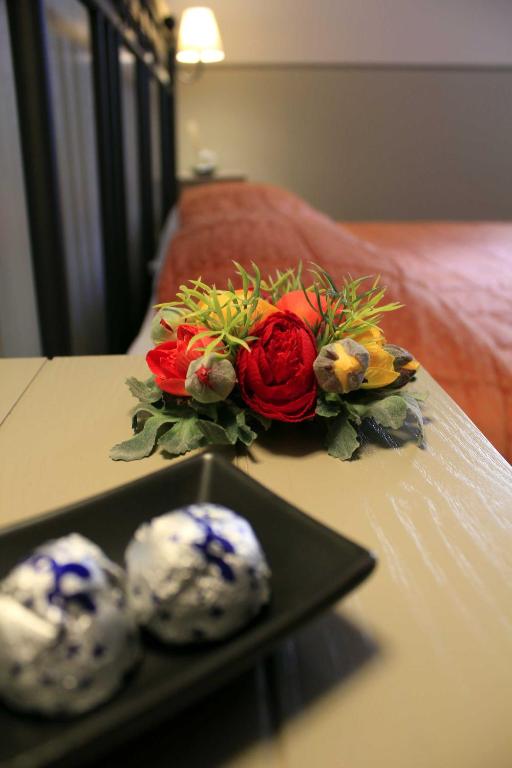 Postel nebo postele na pokoji v ubytování Albergo Benito
