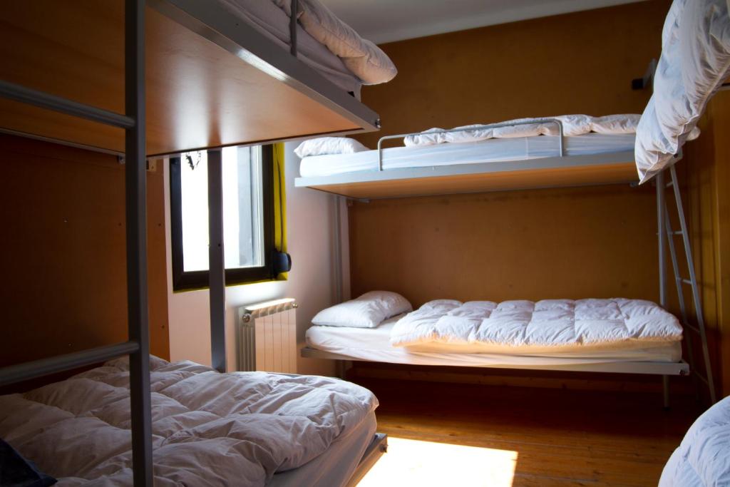 Postel nebo postele na pokoji v ubytování Albergue Montes de Anaga