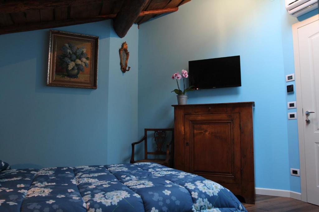 Postel nebo postele na pokoji v ubytování Relais Corte Sant' Agata B&B