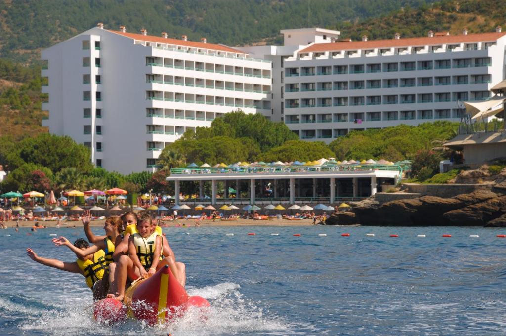 a group of people riding on a raft in the water at Hotel Grand Efe in Özdere