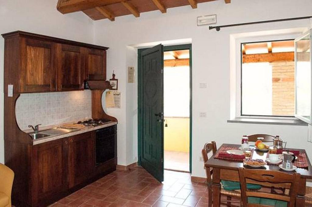 A kitchen or kitchenette at Il Poggio Delle Ginestre
