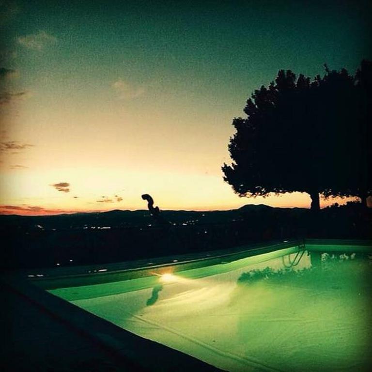 The swimming pool at or close to Il Poggio Delle Ginestre