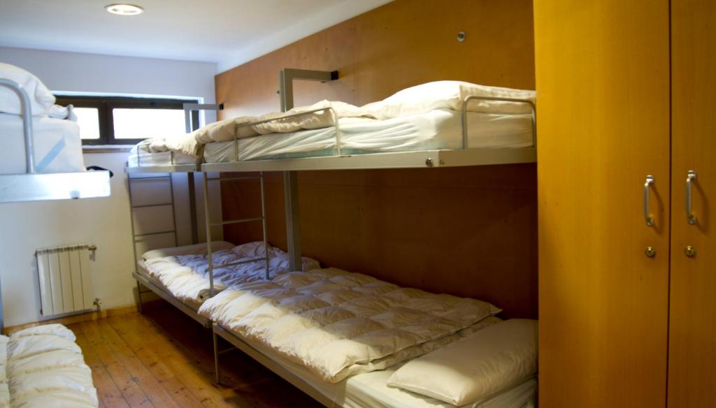 Postel nebo postele na pokoji v ubytování Albergue Montes de Anaga