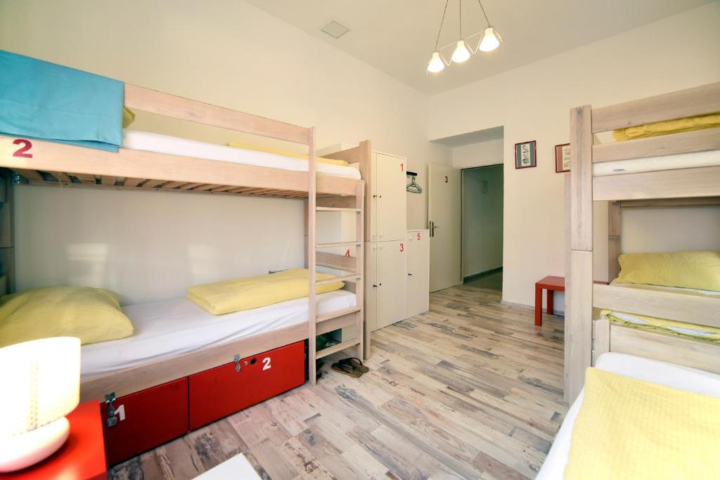 Postel nebo postele na pokoji v ubytování Hostel Temza