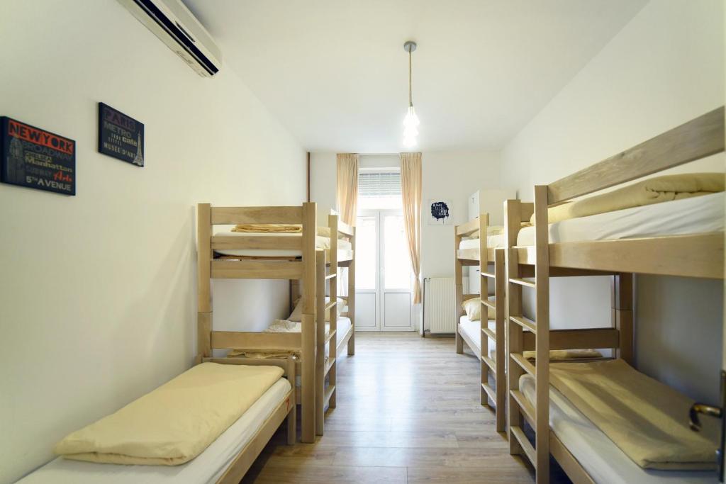 Postel nebo postele na pokoji v ubytování Hostel Temza