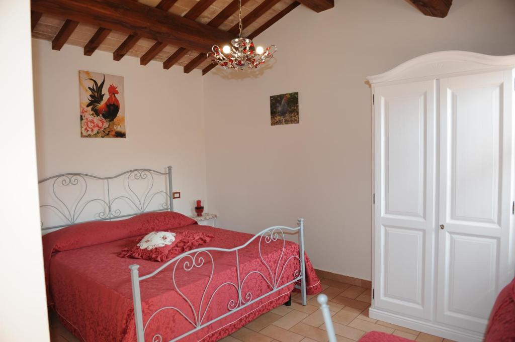 Łóżko lub łóżka w pokoju w obiekcie Agriturismo "La Fraschetta"