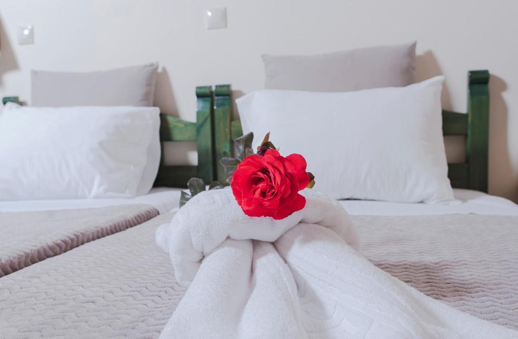 Łóżko lub łóżka w pokoju w obiekcie Kyriaki's Cozy Apartments