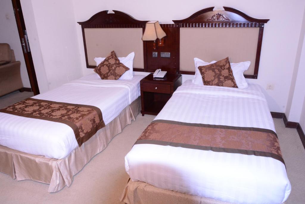 Postel nebo postele na pokoji v ubytování Debredamo Hotel
