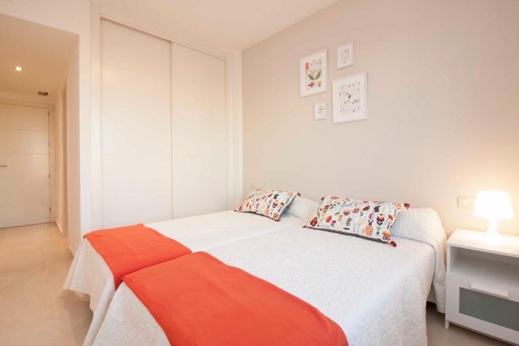 Postel nebo postele na pokoji v ubytování Malaga Center Flat Holidays Atarazanas Market