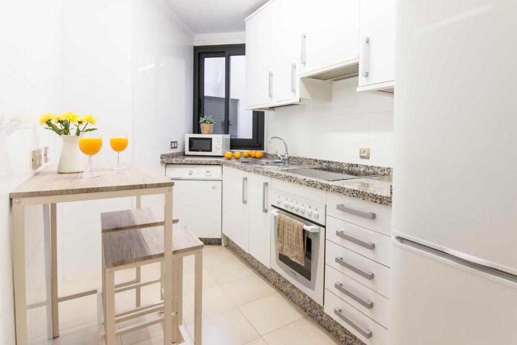 Kuchyň nebo kuchyňský kout v ubytování Malaga Center Flat Holidays Atarazanas Market
