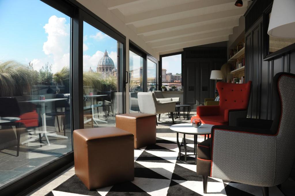 Un lugar para sentarse en Trianon Borgo Pio Aparthotel