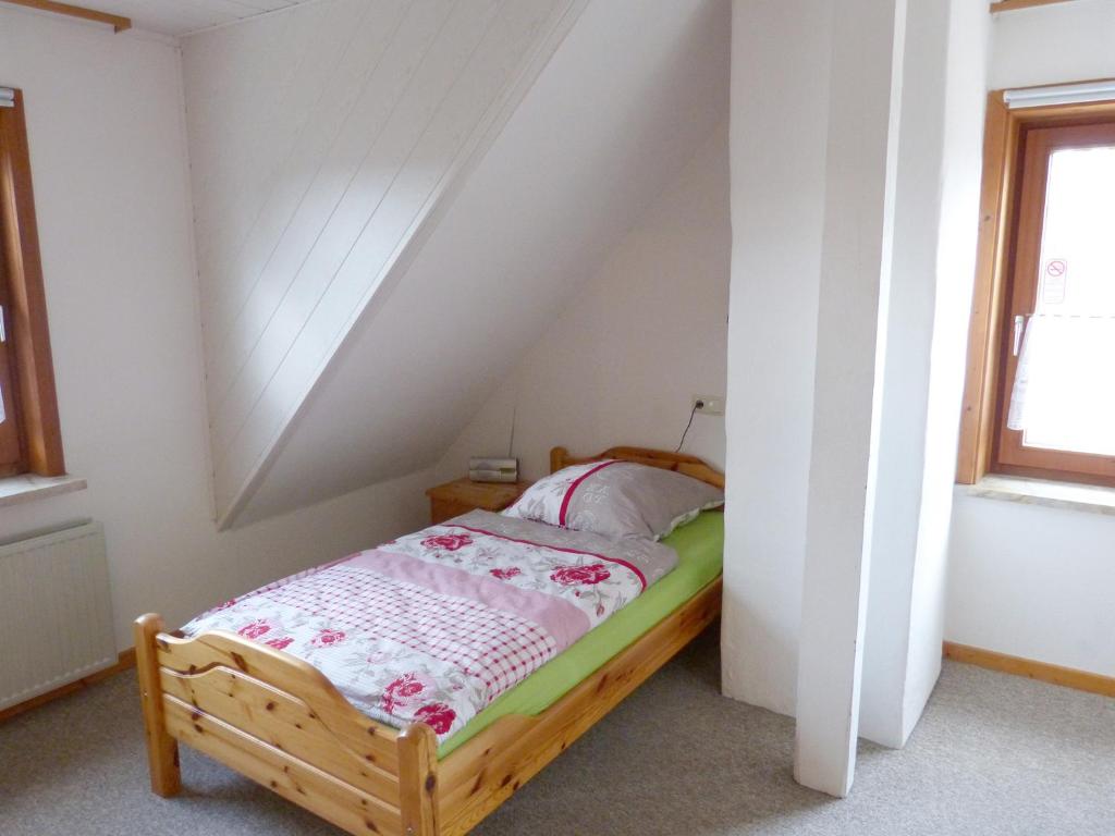 Postel nebo postele na pokoji v ubytování Haus Elbtalaue