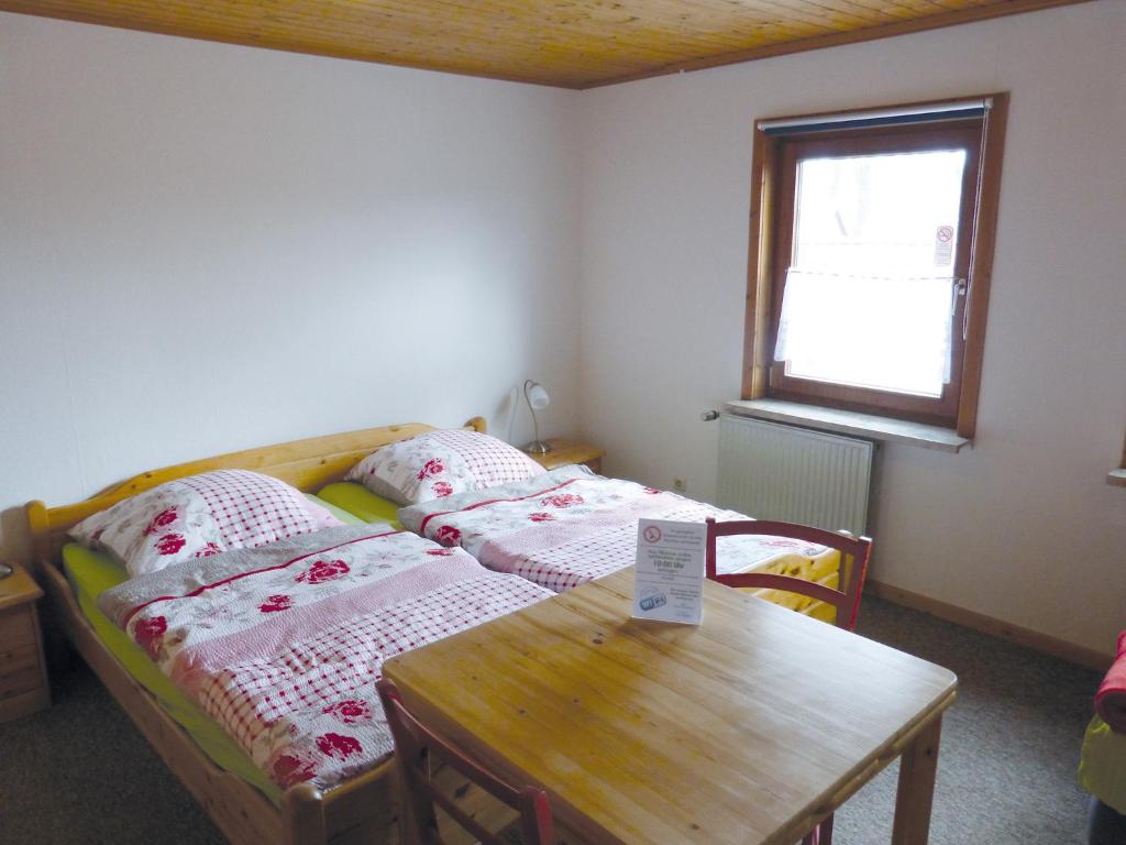 Postel nebo postele na pokoji v ubytování Haus Elbtalaue