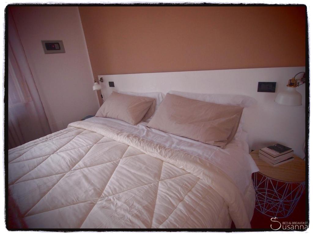 Postel nebo postele na pokoji v ubytování B&B Susanna