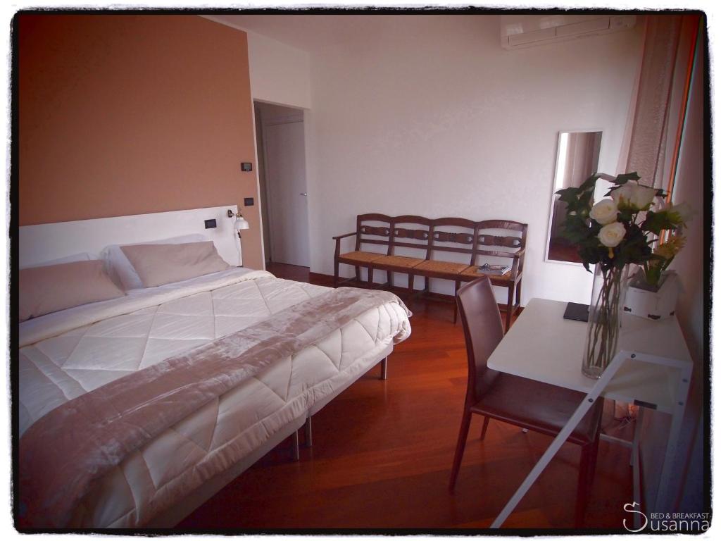 Postel nebo postele na pokoji v ubytování B&B Susanna