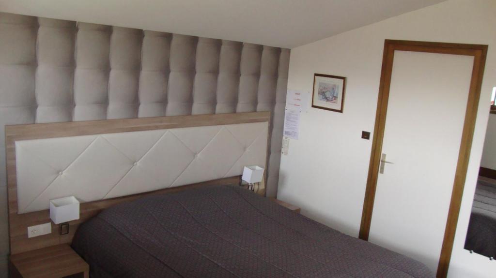 Postel nebo postele na pokoji v ubytování Hotel Pikassaria