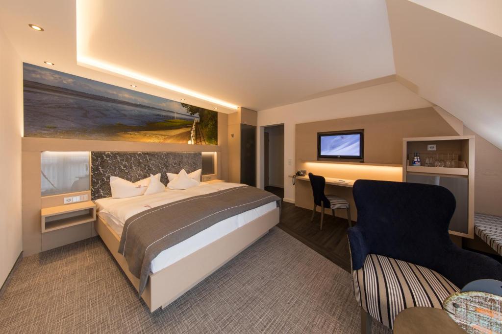 Postel nebo postele na pokoji v ubytování Hotel Graf Bentinck